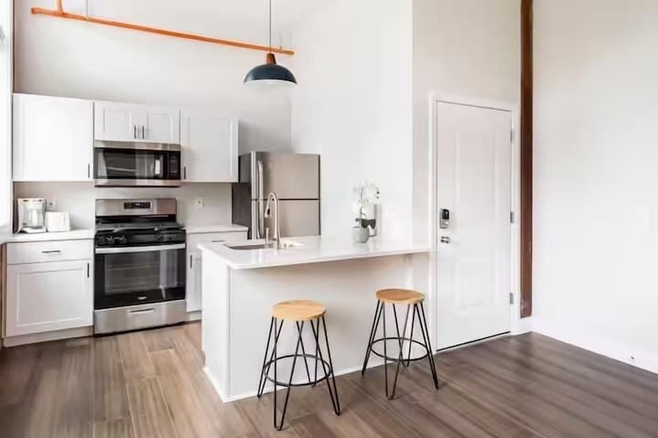 Kitchen counter with high top stools