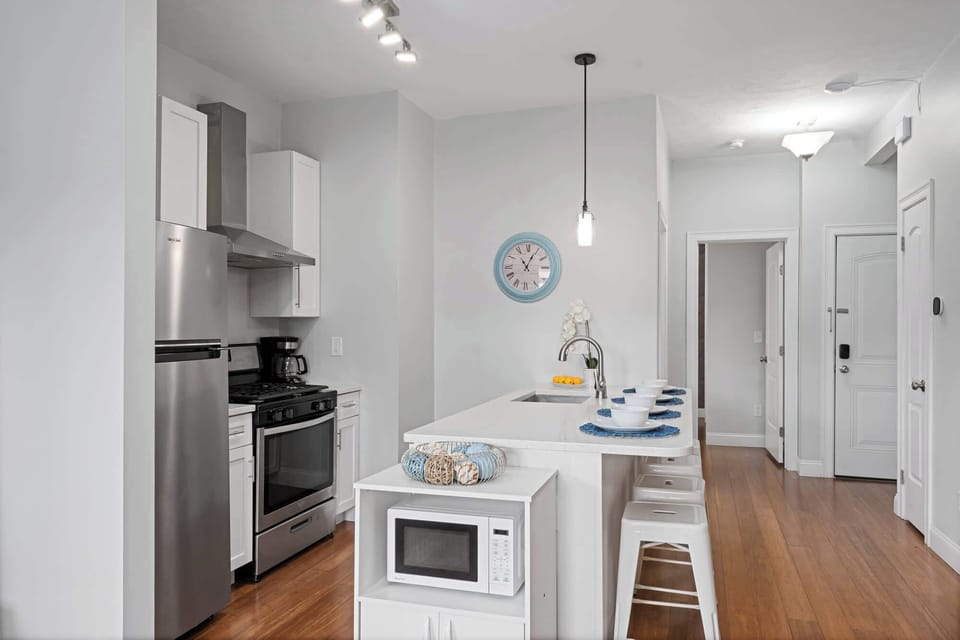 Kitchen has a dishwasher and gas stove