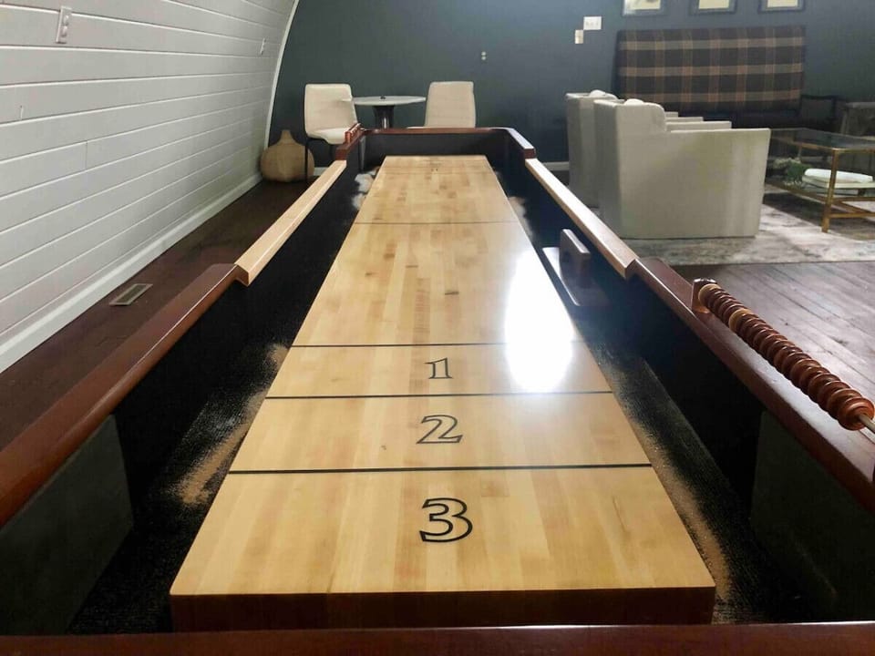 Bring your A game to our shuffleboard table!