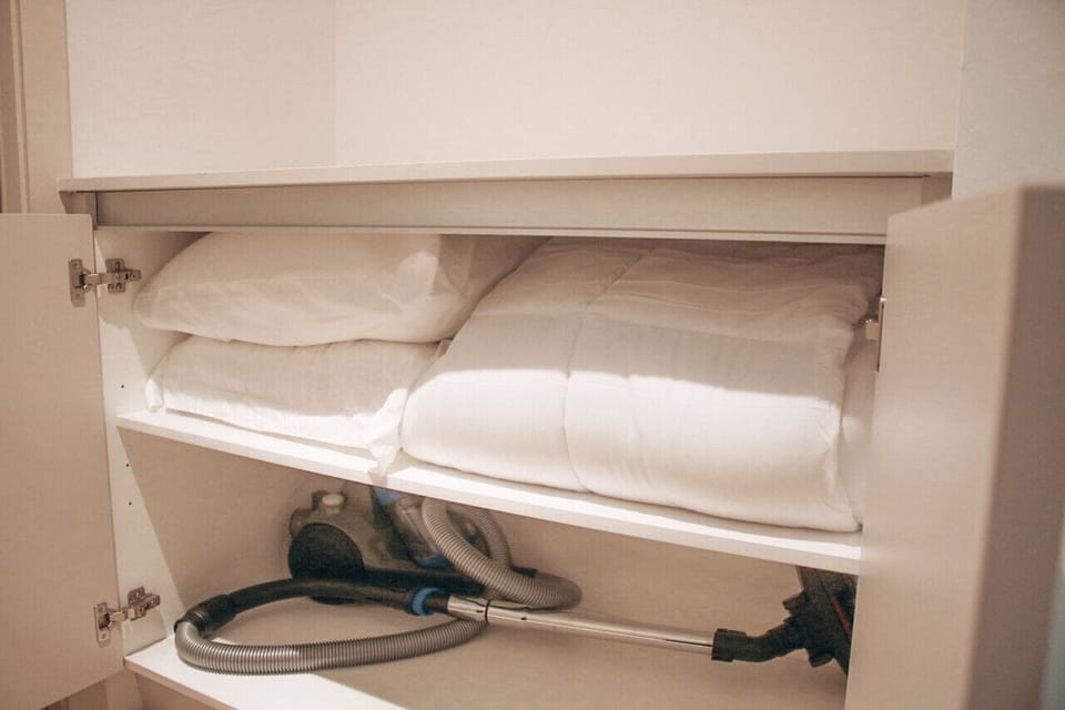 Storage Cabinet with Extra Pillows & Duvet for Sofabed