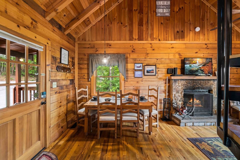 Our dining nook is right by the window, offering you a lovely view of the forest while you enjoy your meals.