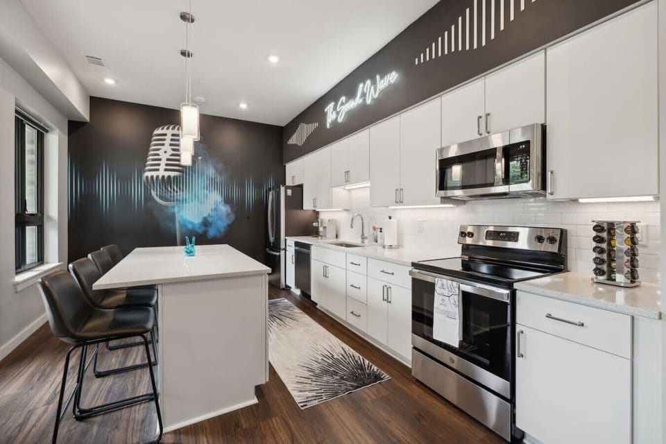 Fully stocked kitchen with everything you need—plus a Keurig + starter K-Cups to kick off your mornings. Enjoy modern appliances, spacious countertops, and an island made for breakfast (or late-night snacks).