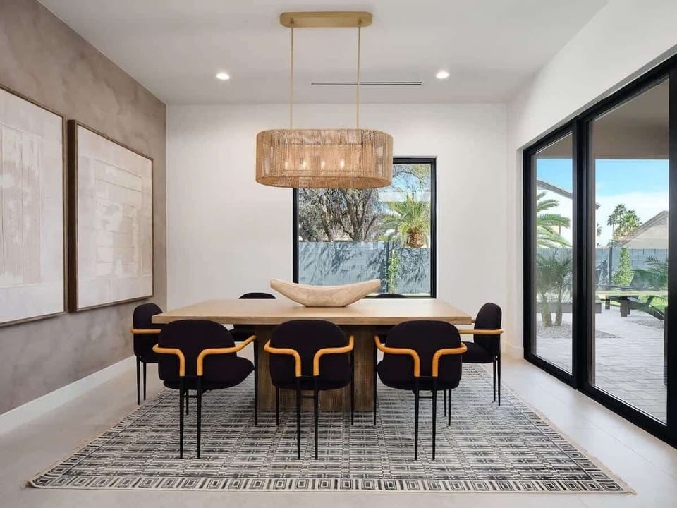 Unit 1: Formal dining area set for 8 guests.
