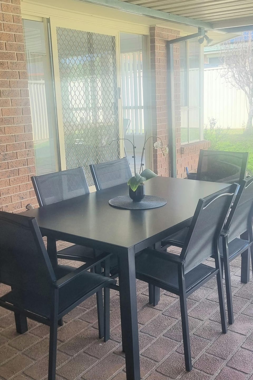 Covered outdoor dining area. 