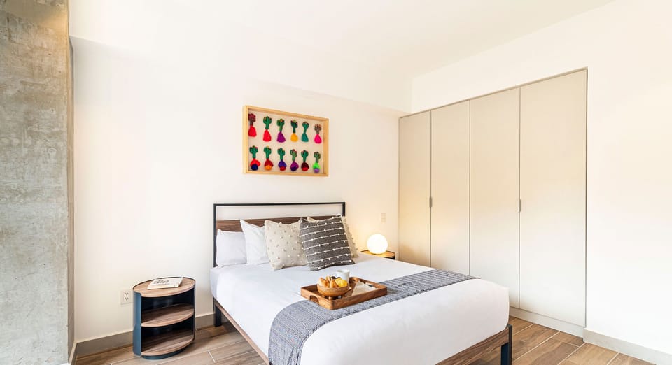 The building contains several similar units, Furniture, decor, and amenities may vary.