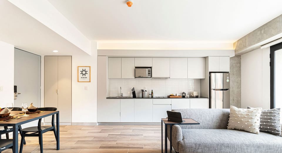 The building contains several similar units, Furniture, decor, and amenities may vary.