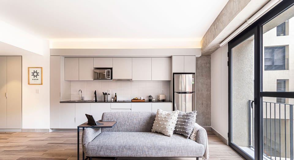 The building contains several similar units, Furniture, decor, and amenities may vary.