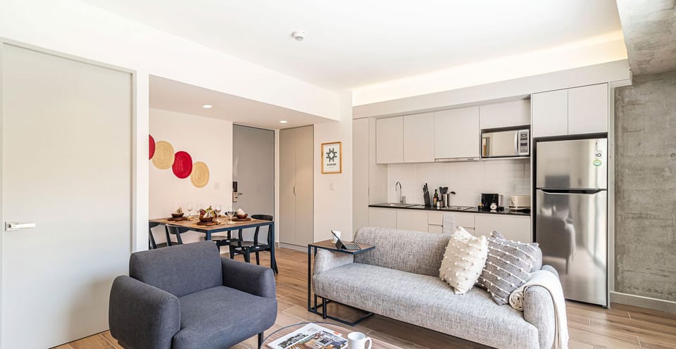 The building contains several similar units, Furniture, decor, and amenities may vary.