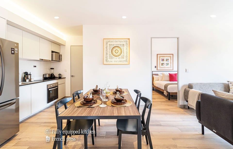The building contains several similar units, Furniture, decor, and amenities may vary.