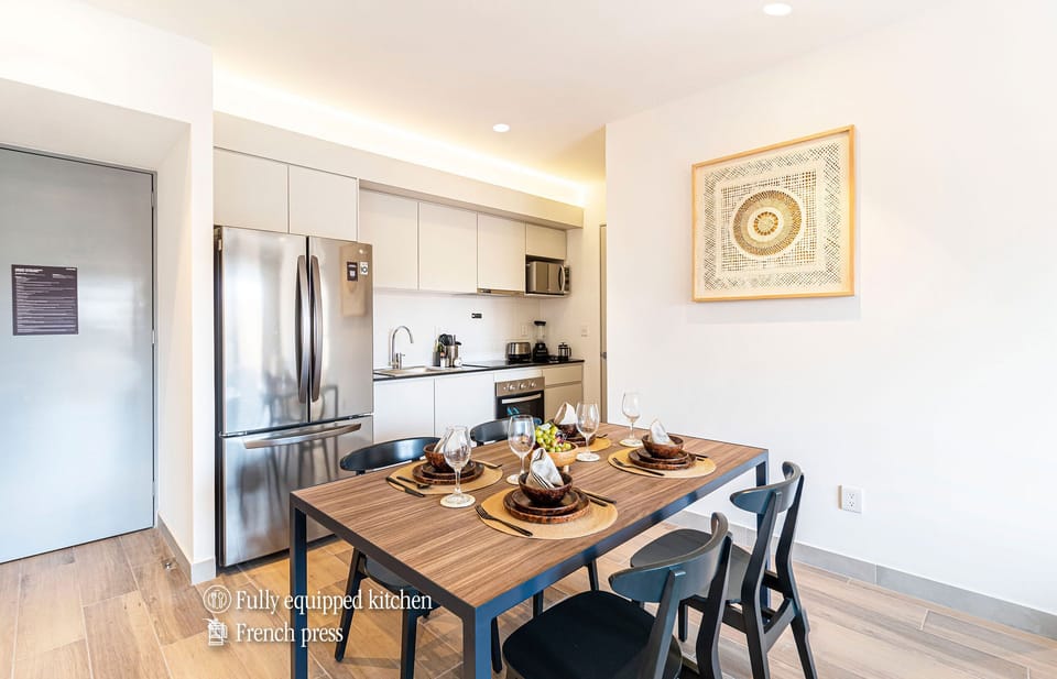 The building contains several similar units, Furniture, decor, and amenities may vary.