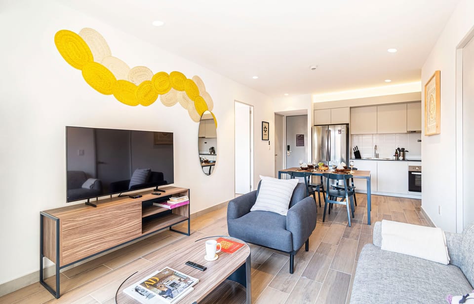 The building contains several similar units, Furniture, decor, and amenities may vary.
