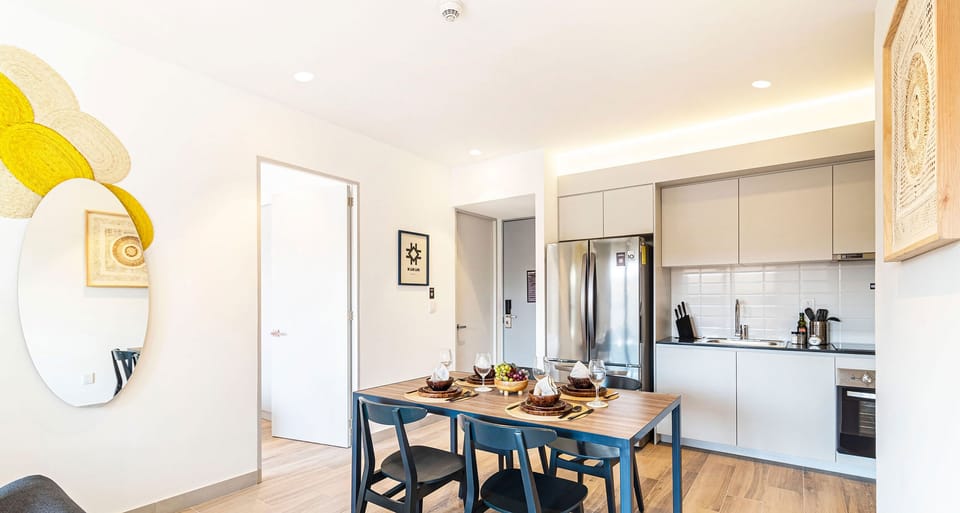 The building contains several similar units, Furniture, decor, and amenities may vary.