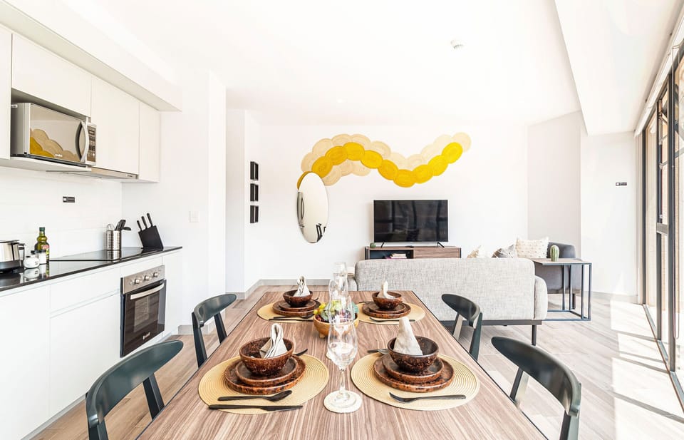 The building contains several similar units, Furniture, decor, and amenities may vary.