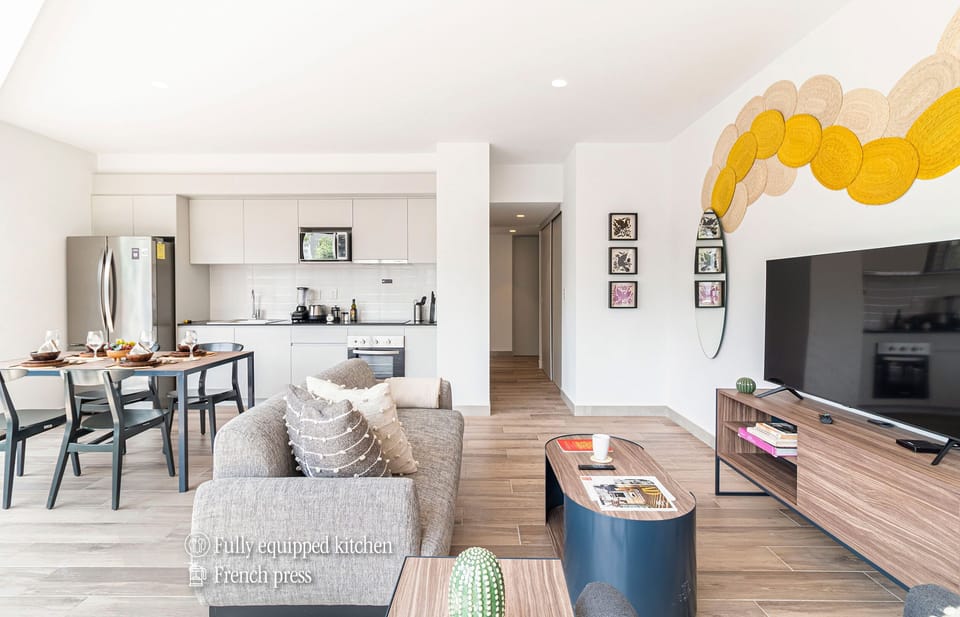 The building contains several similar units, Furniture, decor, and amenities may vary.