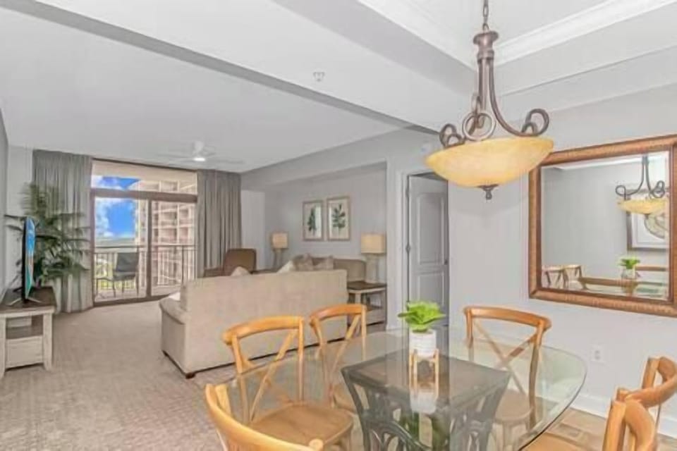 Dining room seating for 6 with open floor plan and view of living room!