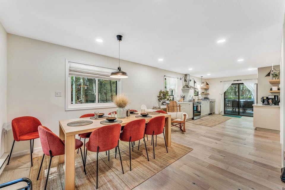 Enjoy the cozy, open-layout living room, seamlessly connected to the kitchen and dining area