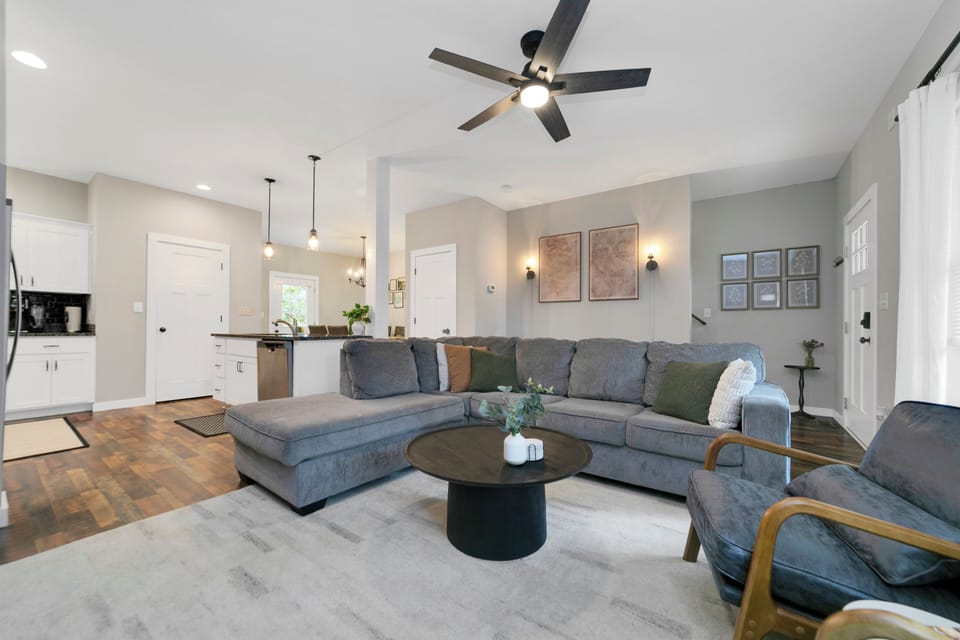Living room opens up into kitchen and then dining area. 