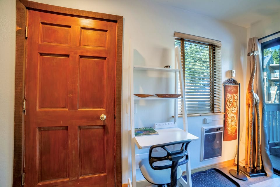Dedicated workspace with desk and chair.