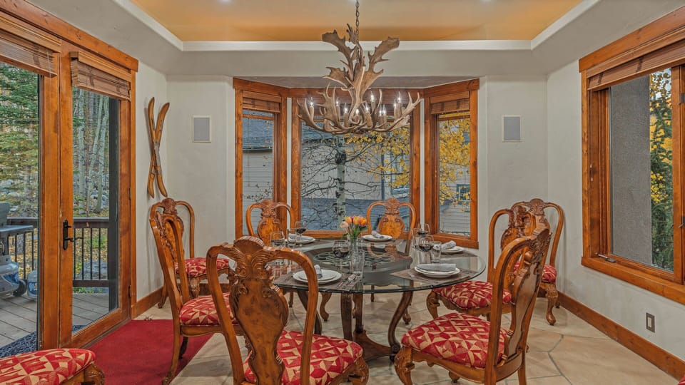 Dining area on main level with back patio access