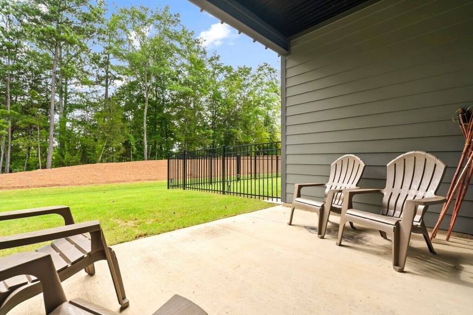 Relax outdoors with peaceful backyard views and plenty of green space.