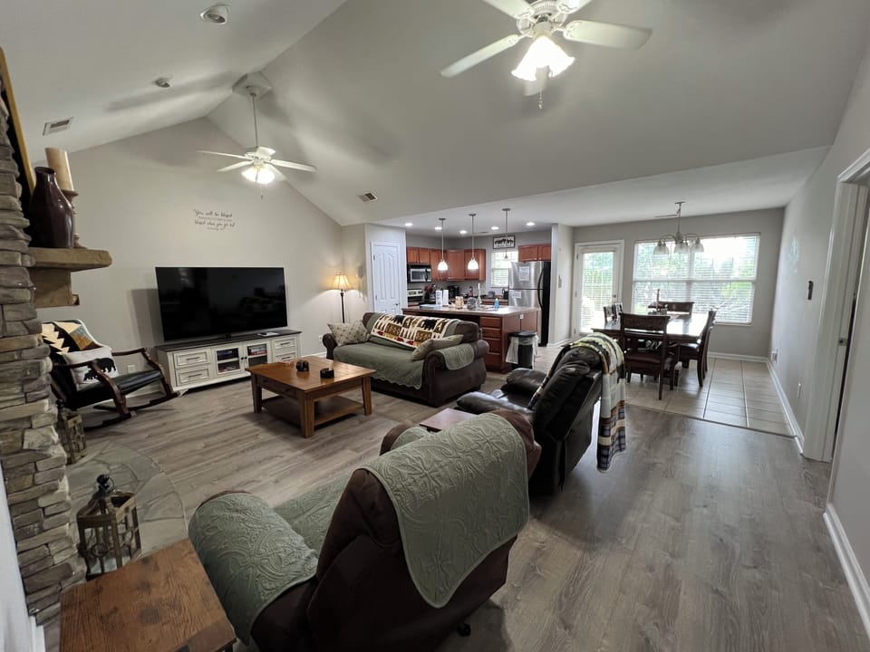 open floor plan to the livingroom, kitchen, and dining area.