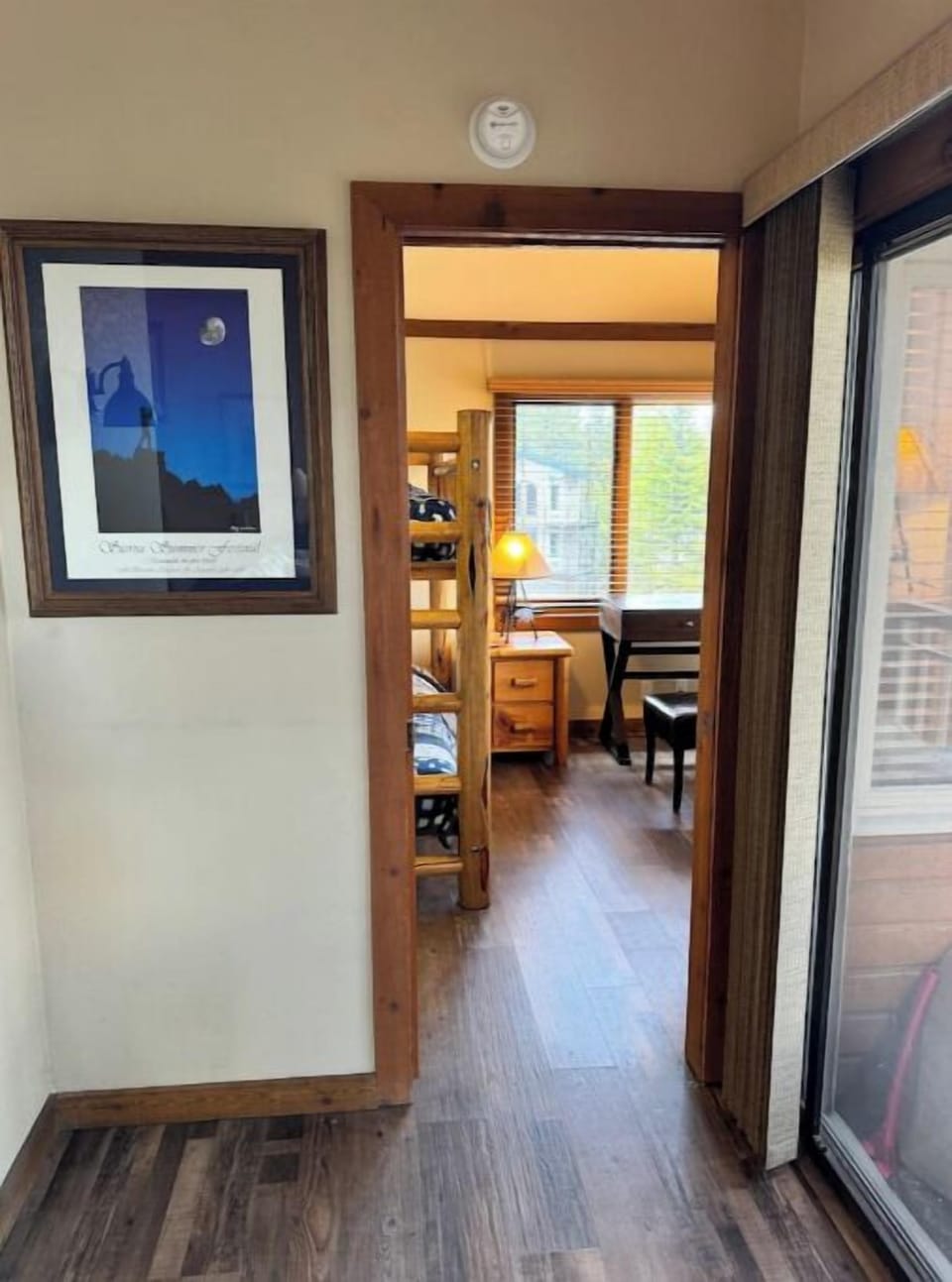 View of Bedroom 3 from hallway.  Deck on right.