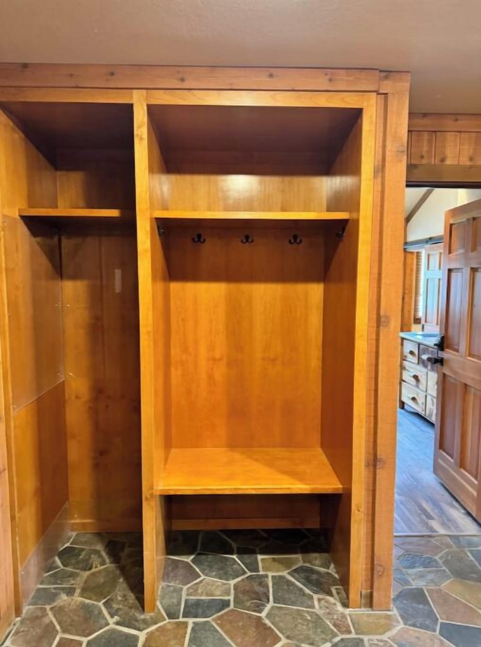Large entry way with loads of storage for skis, snowboards, boots, jackets, etc.