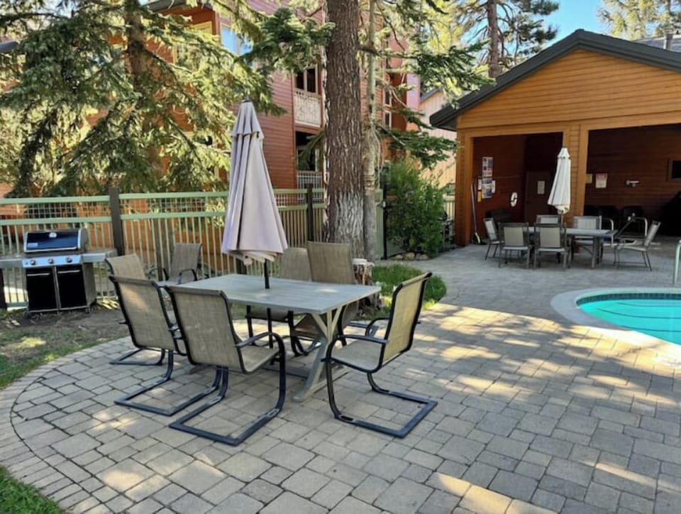 Spa, pool and BBQ area are right outside the building to the left.