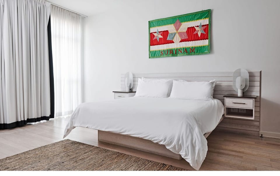 Drift off peacefully in a serene, minimalist bedroom retreat.