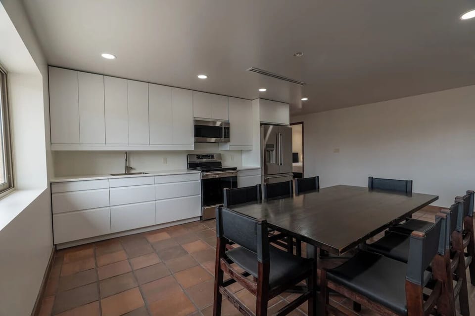 Full kitchen and dining area