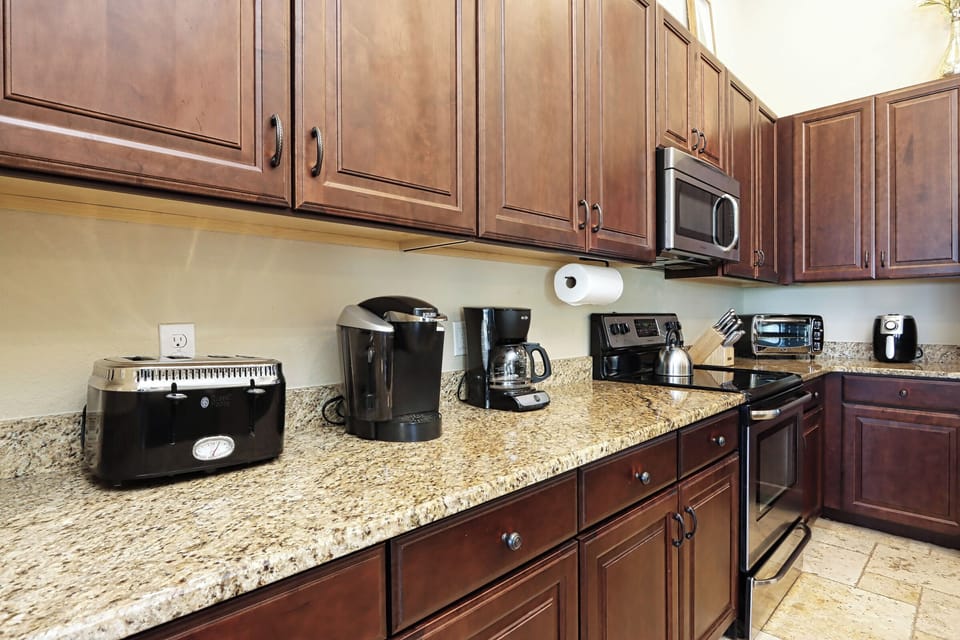 Fully equipped kitchen—brew a fresh cup, toast 4 slices, or pop in the toaster oven