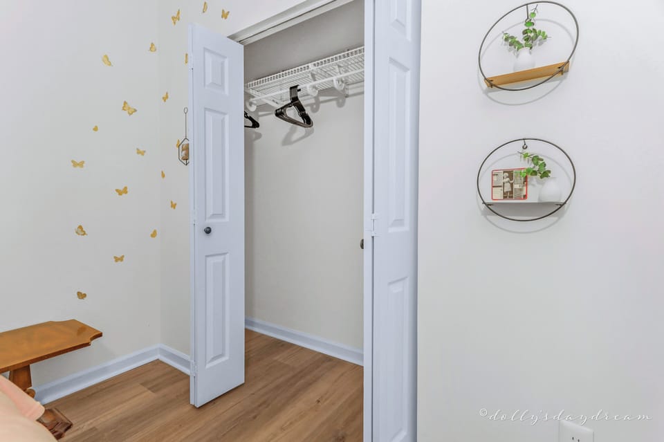 Primary bedroom has plenty of room for all your fanciest fits.