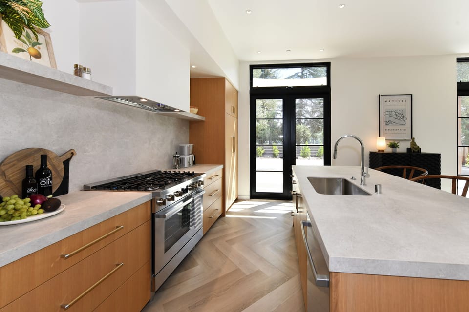 French doors lead to outdoor dining
