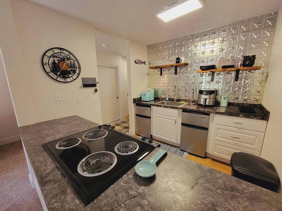 Kitchen with two space saving refrigerators
