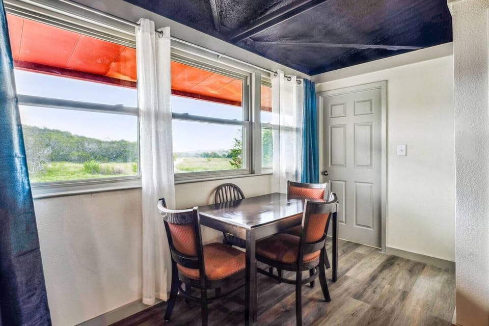 In addition to the main dining area, this extra dining space provides more room for guests to gather. It's perfect for large groups or families looking for additional seating during meals.