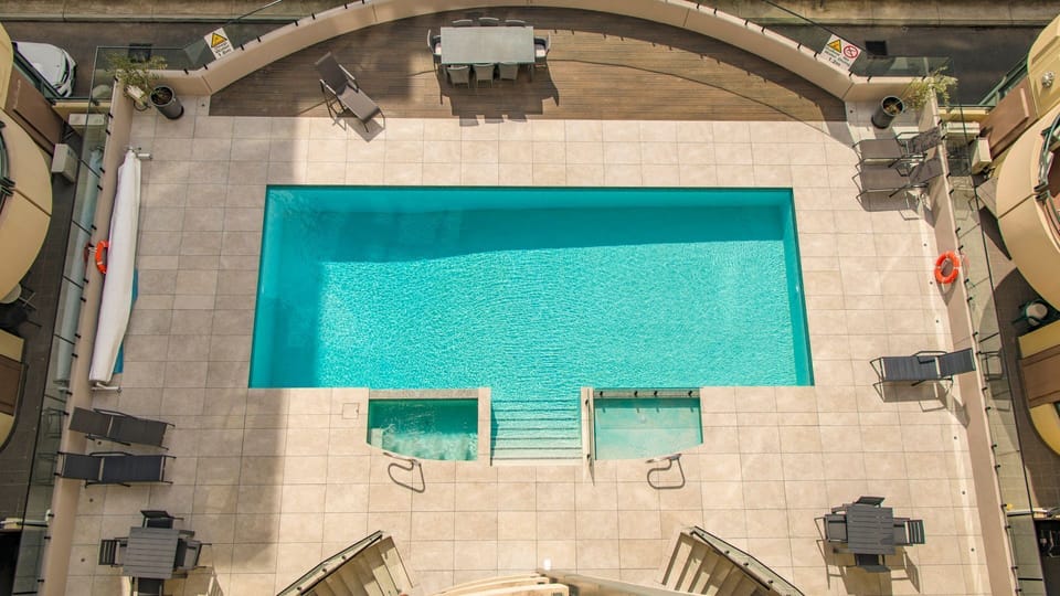 Enjoy shared pool facilities — a great way to relax and refresh during your stay.