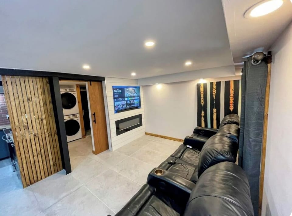 Living room  55in TV and fireplace 