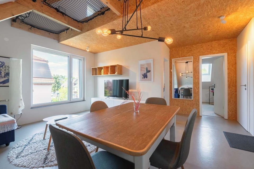 Cozy dining space with natural light and a huge window