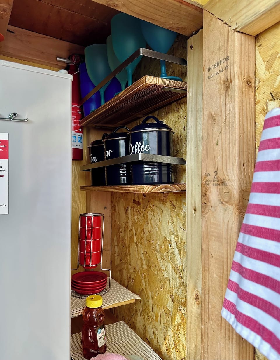 Closeup of the Coffee Station and Mini Fridge shared and provided for guests