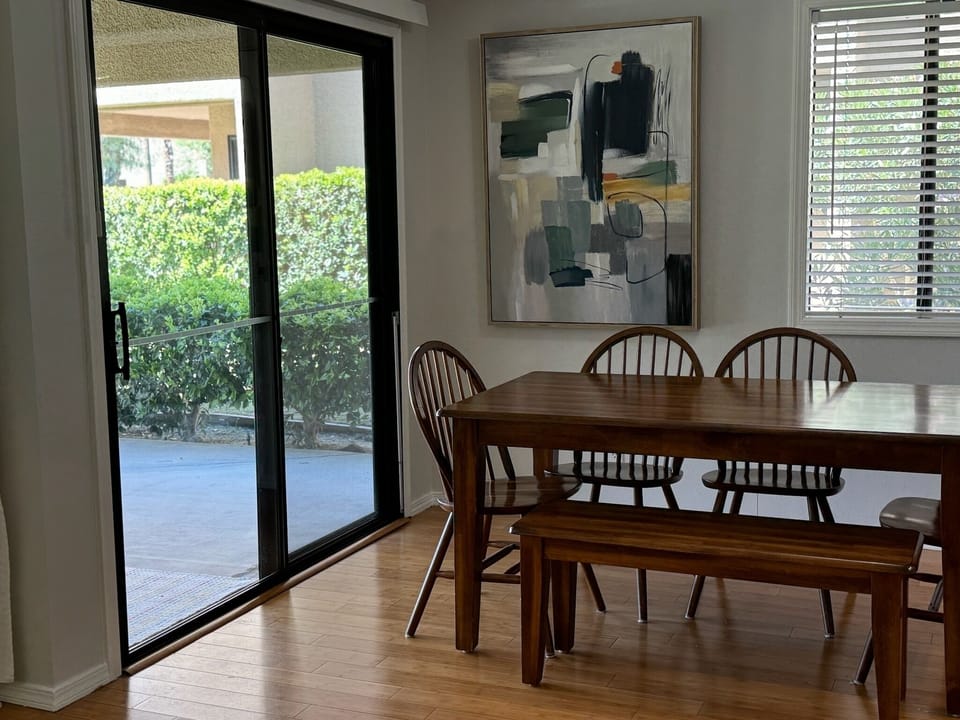 Dining Table - seats 6. Opens onto private patio -to new outdoor table + chairs.