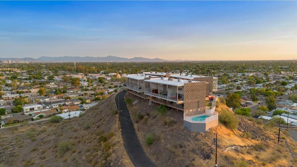 Aerial shot of complex overlooking city