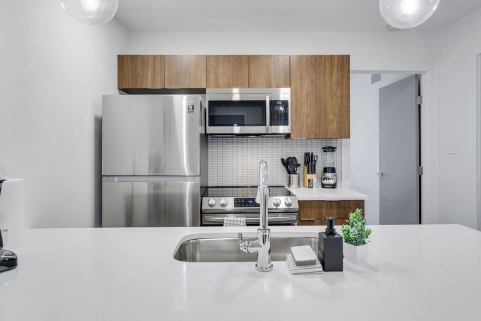 As you step into the kitchen, the clean lines and functional design make you eager to start cooking your favorite dishes.