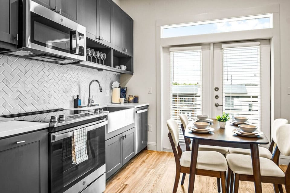 As you open the kitchen, you discover an assortment of coffee pods, and sugar, ensuring you have everything you need for a perfect morning or afternoon pick-me-up.