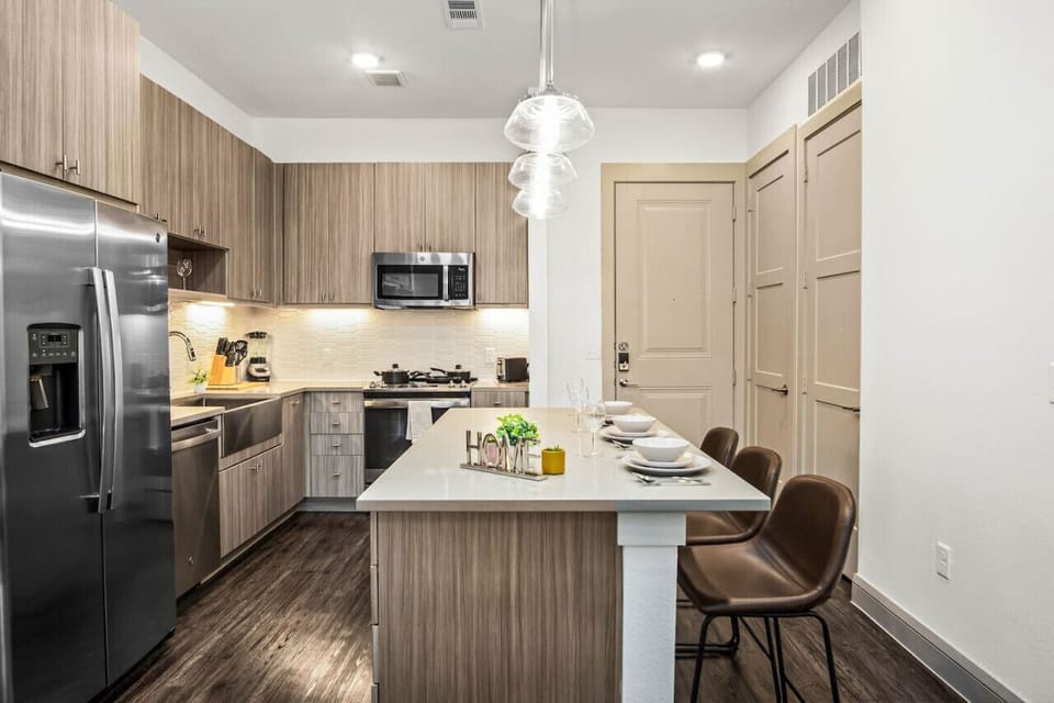 As you take your seat, the dining room's sophisticated design sets the stage for memorable meals and conversations.