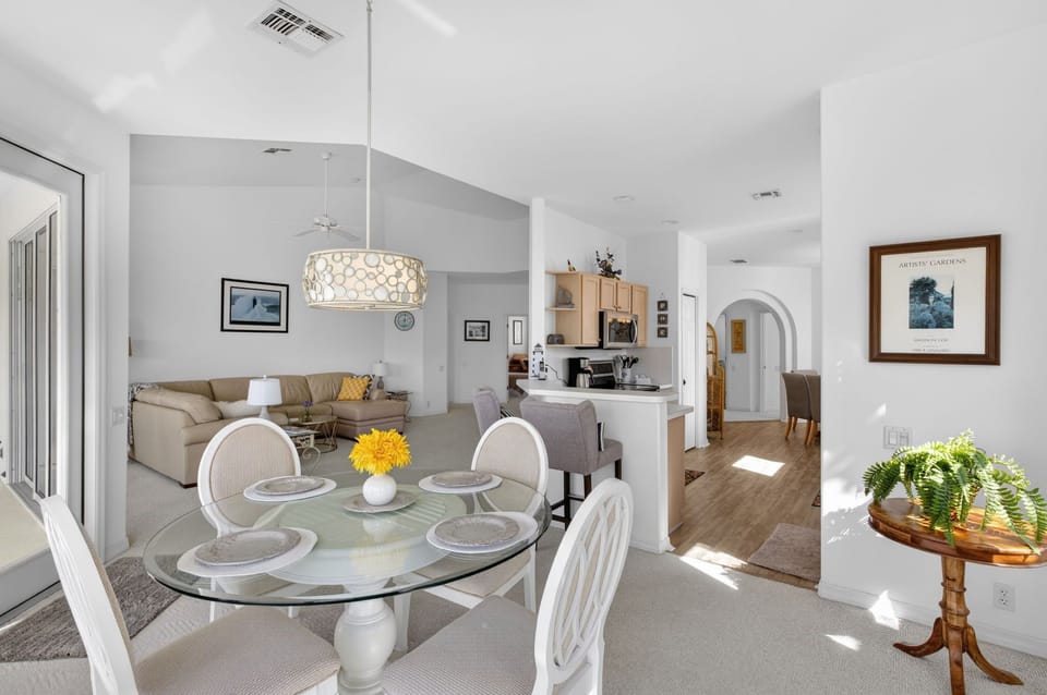 Open layout with dining, living, and kitchen together in a welcoming space.