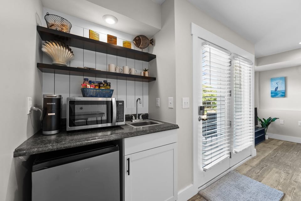 Kitchenette w/ mini fridge, microwave and Keurig