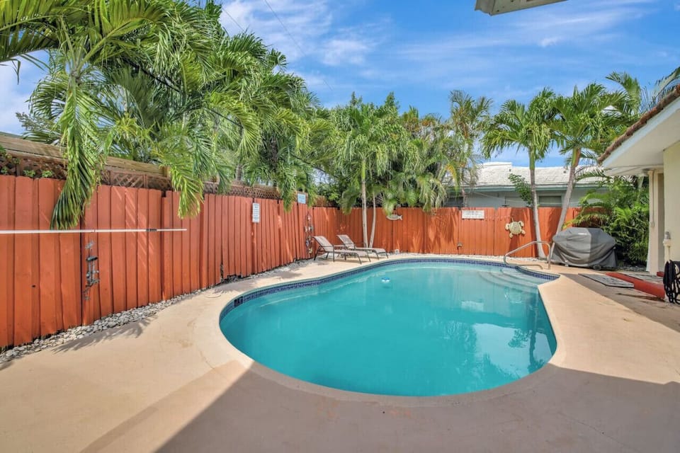 The private pool is shared with only one other unit, ensuring a pleasant and semi-exclusive swimming environment.