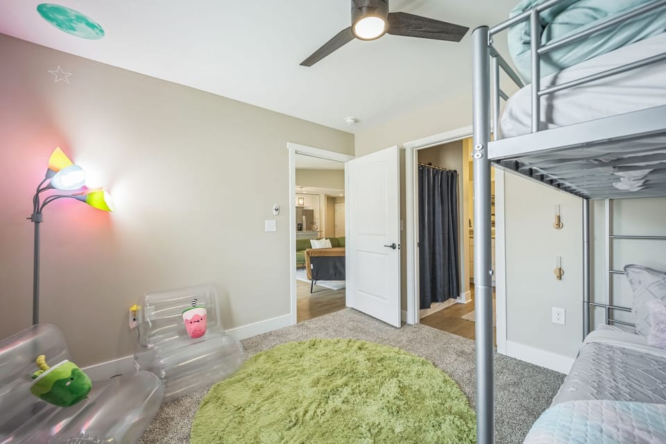 No one will have issues finding the bathroom at night. Glow in the dark stars and awesome night lights will guide the way. Check out the fun mirror that we have in the walk-in closet.