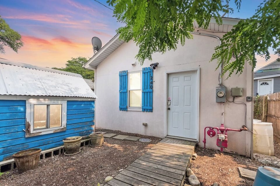 Rear entrance with two free parking spots in your own private driveway (not pictured but just outside of this shot).