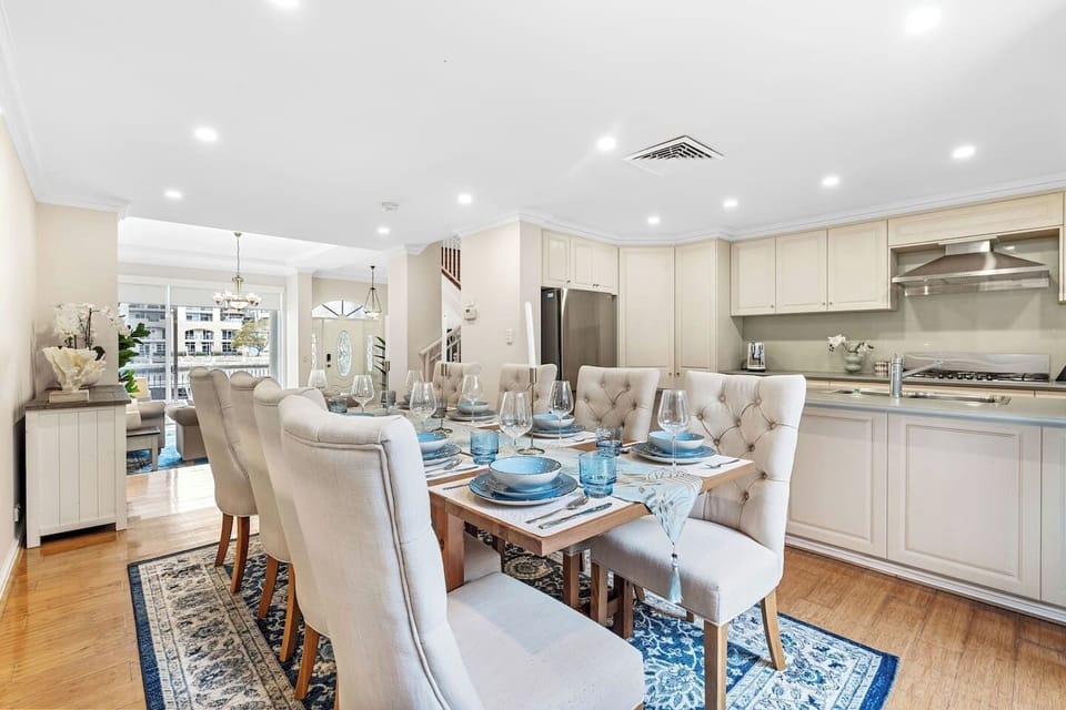Spacious dining area, connected to a modern kitchen — perfect for shared meals.
